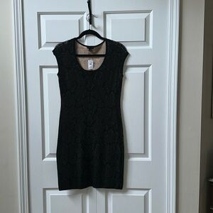 NWT Ann Taylor Fitted Sleeveless Stretchy Dress
Color:  Tan/Black 
Size Medium